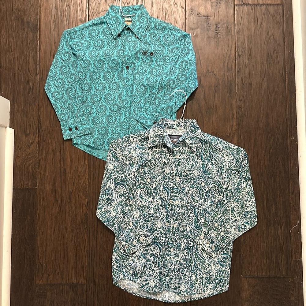 Boys pearl snap long sleeve shirts.